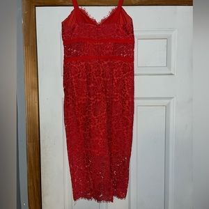 Express Coral lace mid length dress. Size 2, sheer lace around ribs. Zipper back